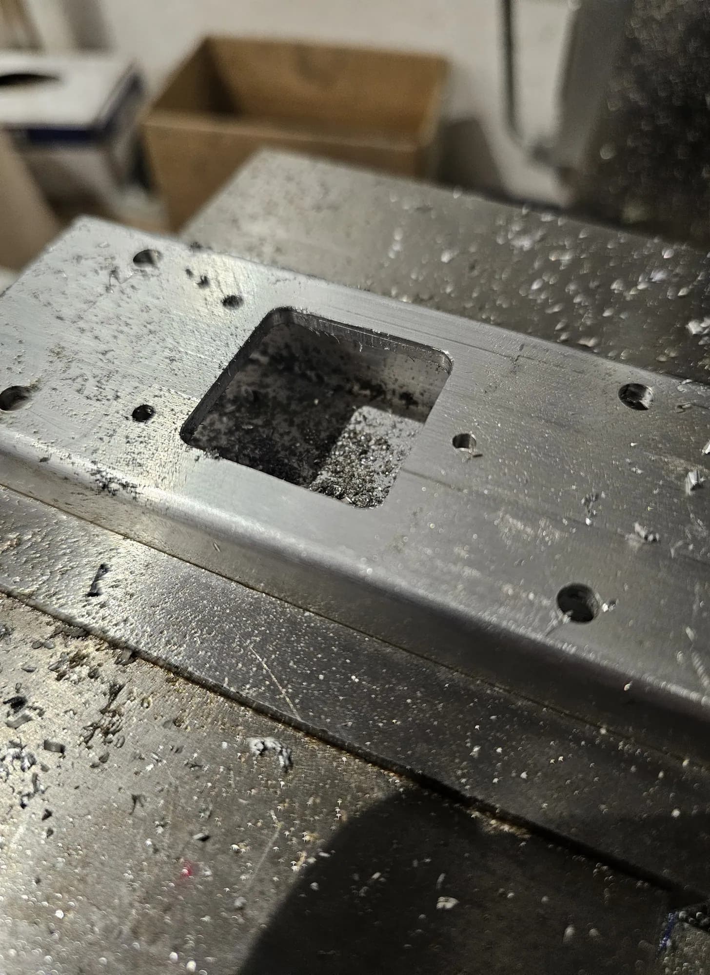 1×2 in tube stock in the vise, cutout milled