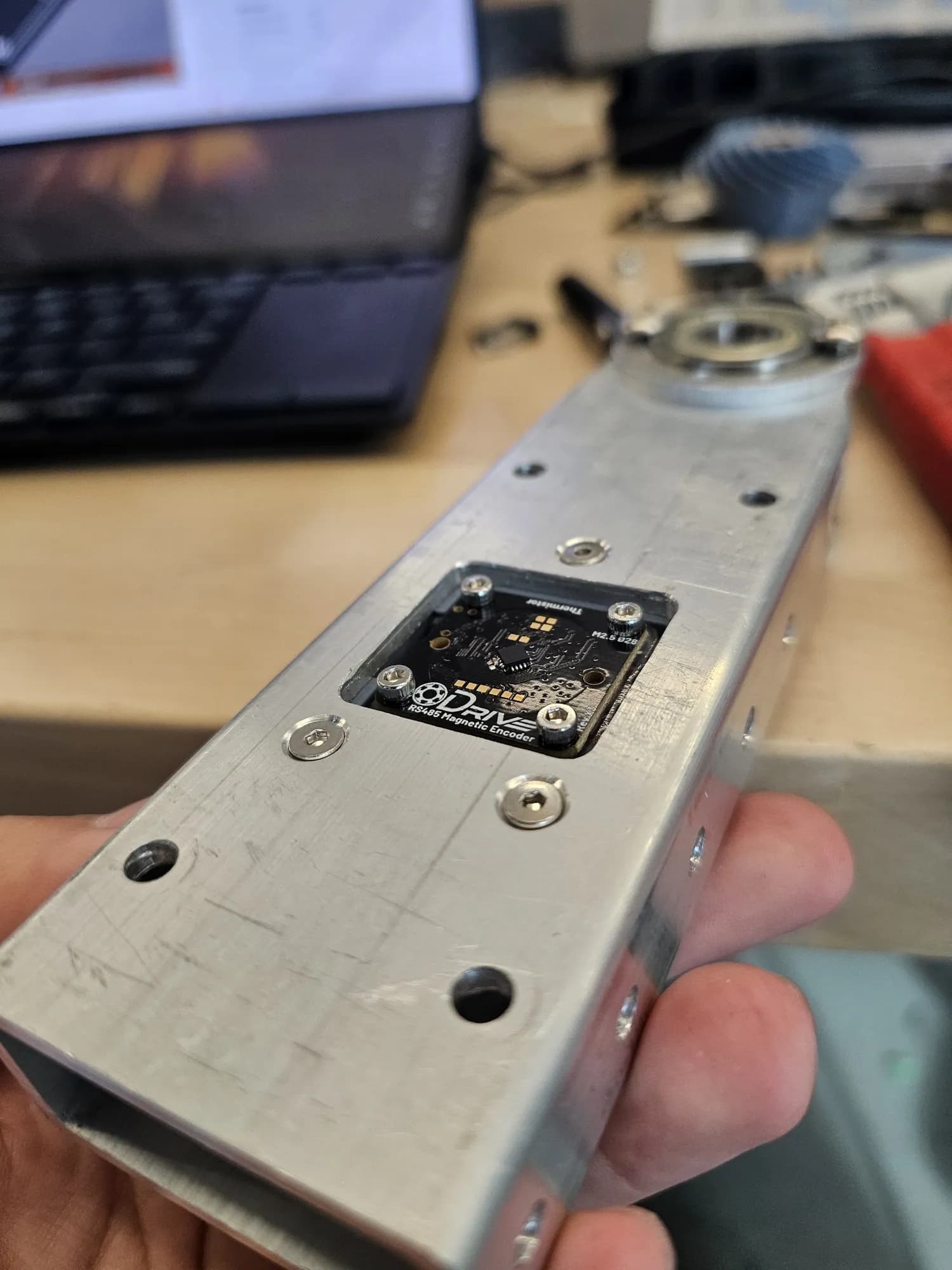 Encoder seated in the milled pocket