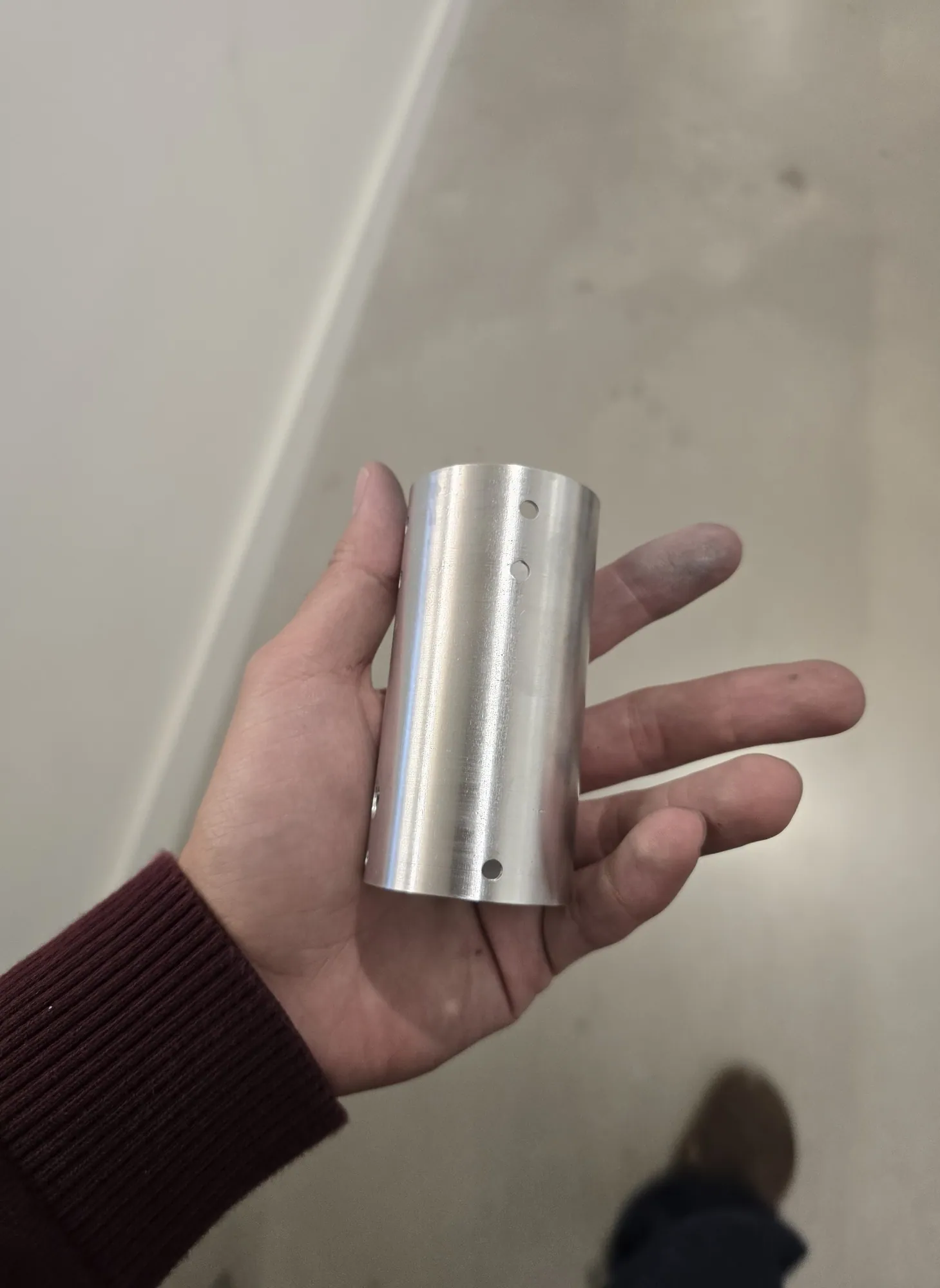 Cache tube: the sample rides up the auger into this