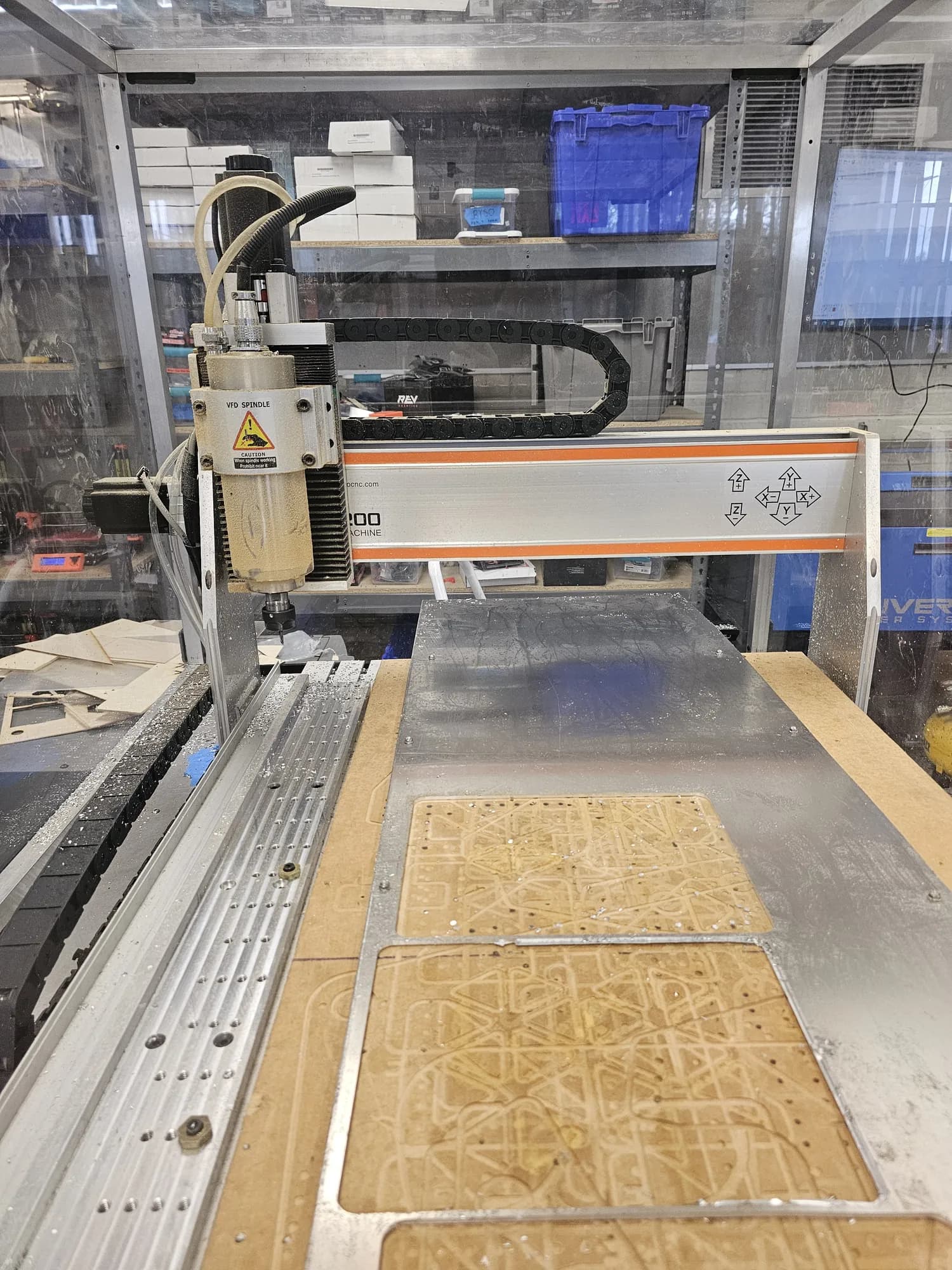 CNC router cutting a nested plate