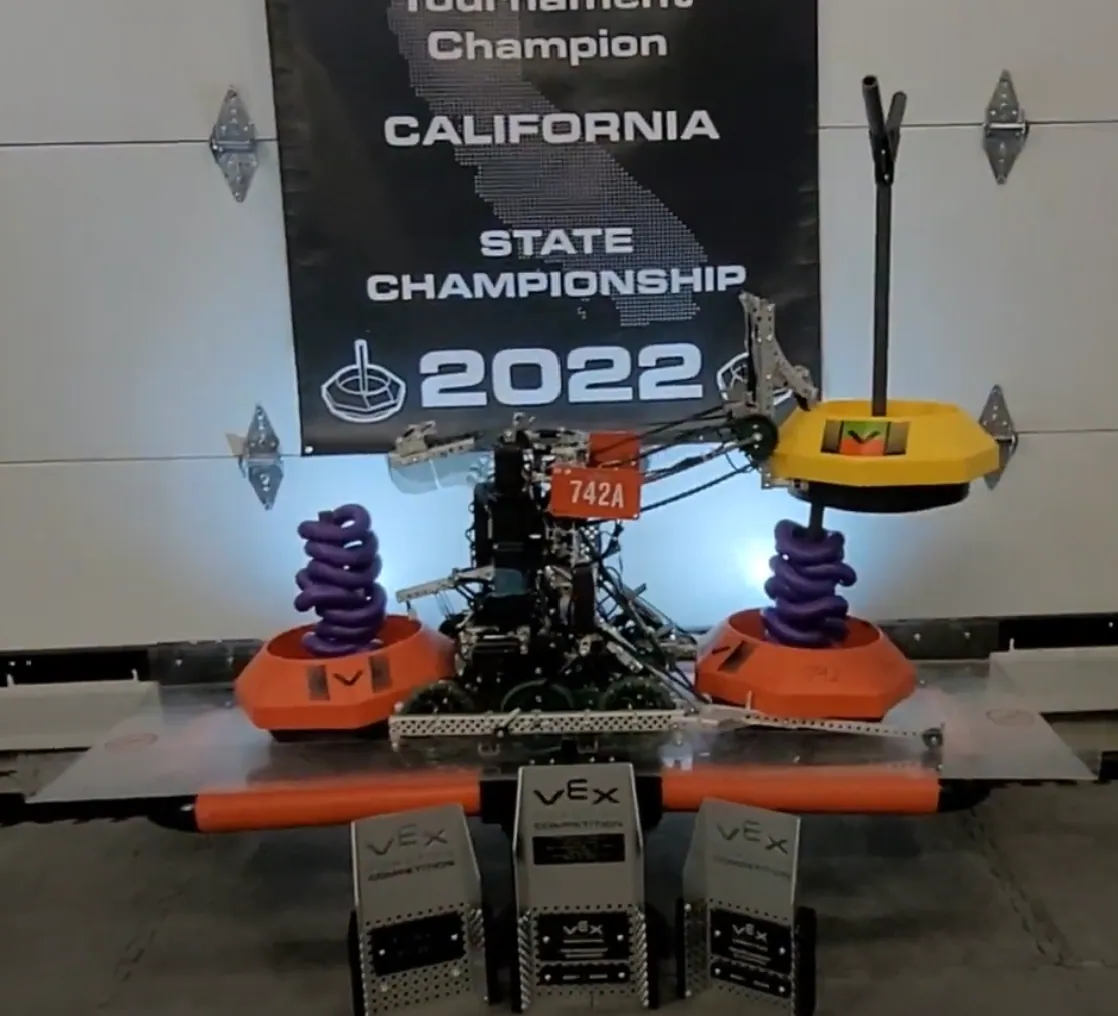2022 Tipping Point: mobile goal clamps and the chain bar lift, under the state banner