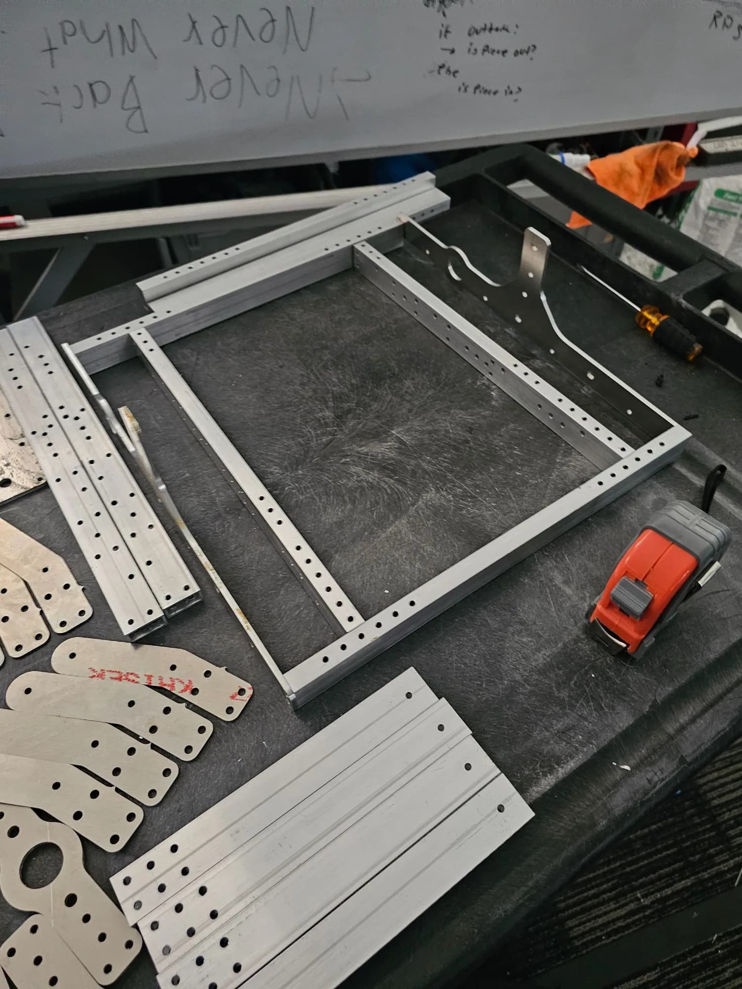 Frame parts staged on the bench