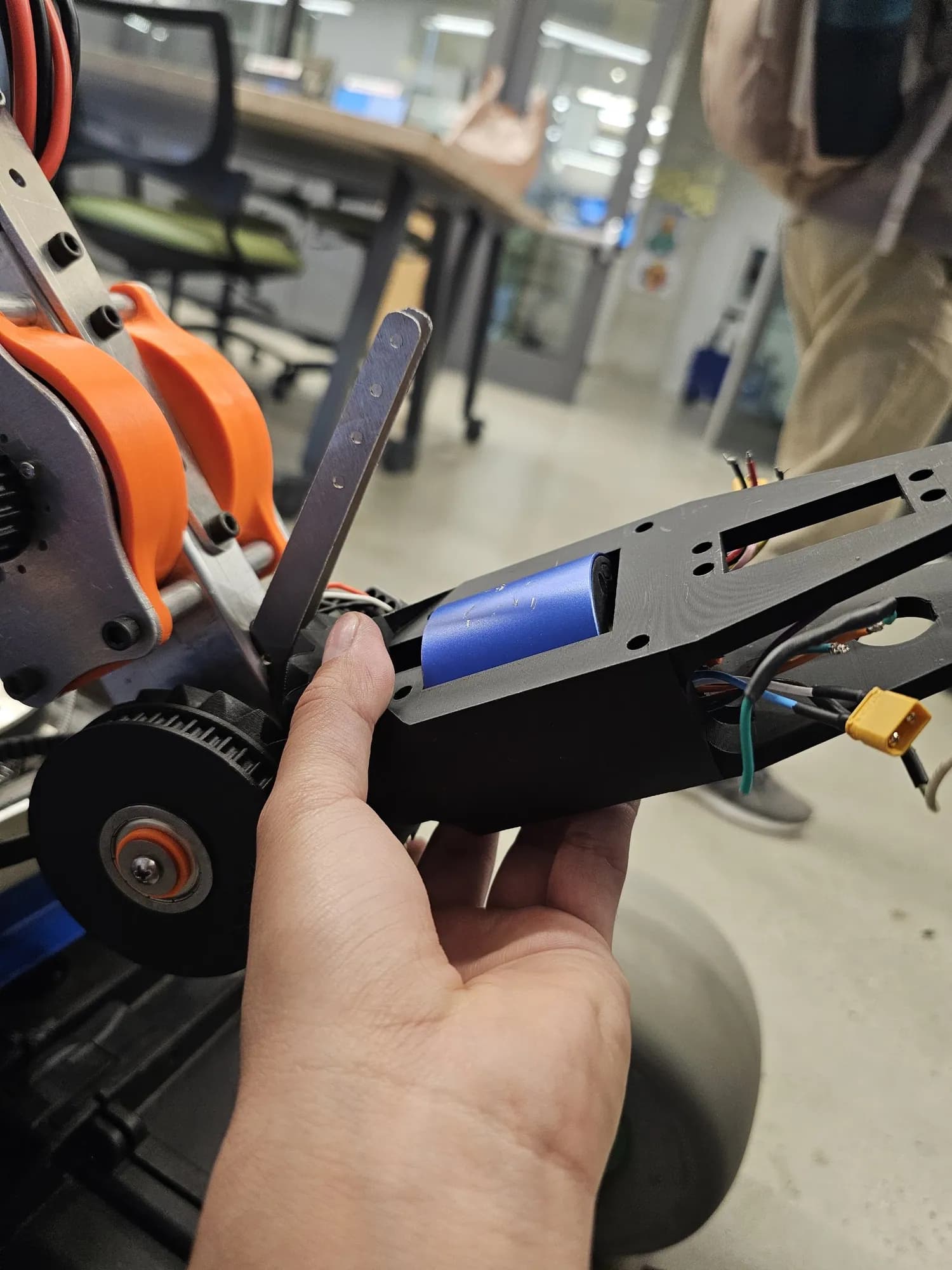 Stem in hand, arm behind